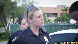 Two spicy and busty police women arresting a big black cock