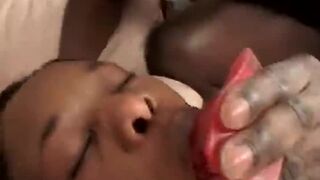 Sexy black babe gets both her holes fucked hard by a huge black cock