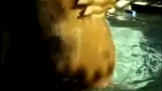 African pregnant chick riding white rod outdoors