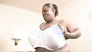 huge chocolate tits that sag down to her waist