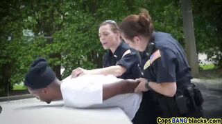 Outdoor threesome with big black cocked dude and two uniformed female cops!