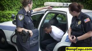 Two busty cops pounded by black dude