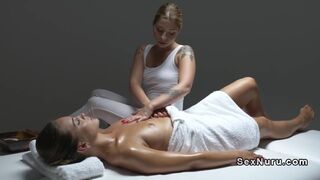 Blonde lesbian masseuse gives cunt massage