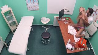 Slim blonde bangs doctor in office