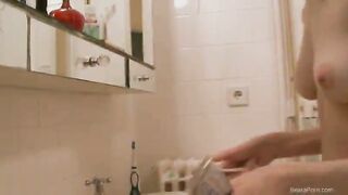 naked titty brunette in the bathroom